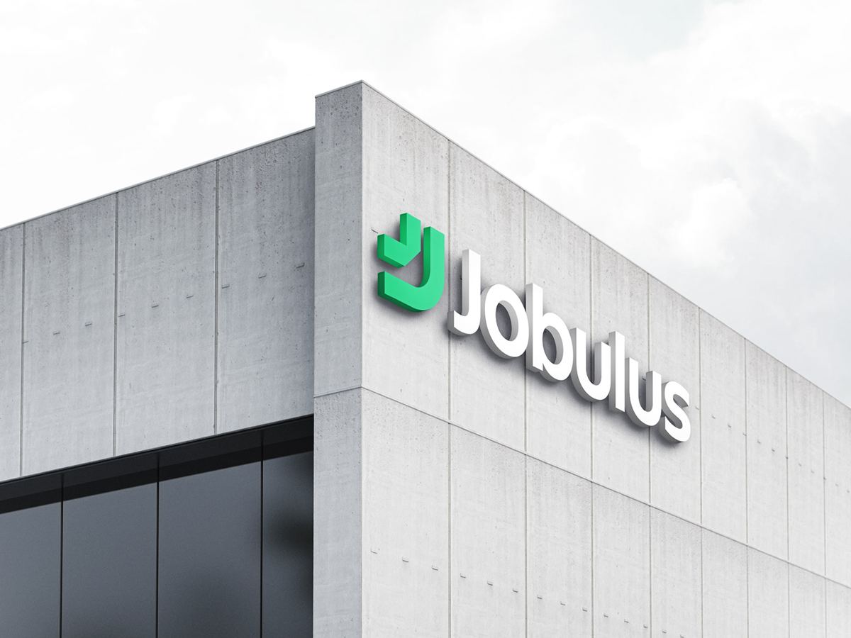 Large 3D Jobulus logo sign on a concrete building facade
