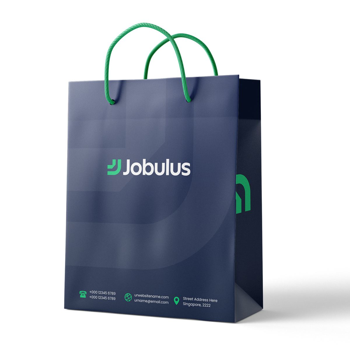 Navy Jobulus paper bag with green handles and logo